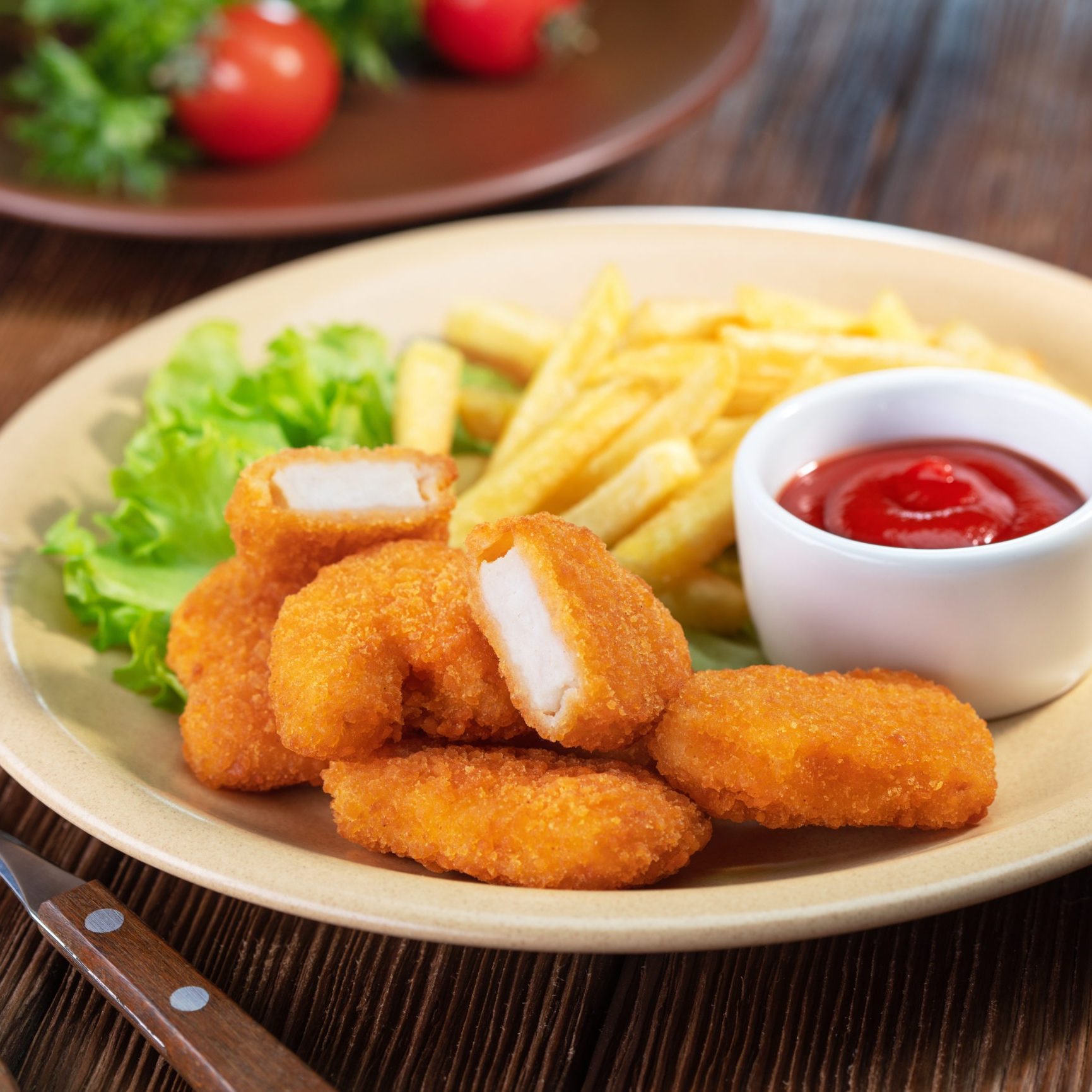 chicken nuggets with french fries and sause